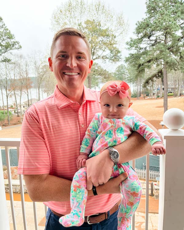 Dr. Wesley Gass holding his child